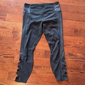 Athleta Black High-Waisted Leggings with Side Cutouts size medium